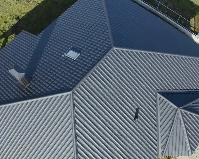 Winter & Son Roofing crew installing long-run steel in Christchurch
